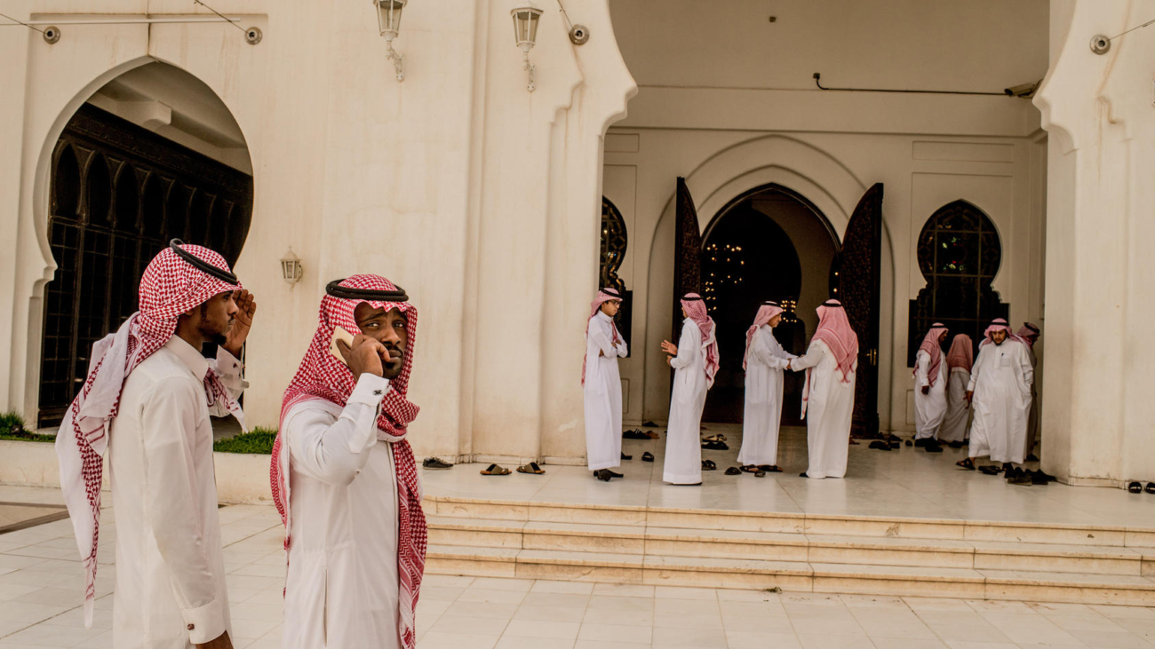 FILE -- Men arrive for prayers at a mosque in Riyadh, Saudi Arabia, May 3, 2015.  There is a broad consensus that the Saudi ideological juggernaut, which exports a fundamentalist strain of Islam known as Wahhabism, has disrupted local Islamic traditions in dozens of countries — the result of lavish spending on religious outreach for half a century, estimated in the tens of billions of dollars. (Tomas Munita/The New York Times)