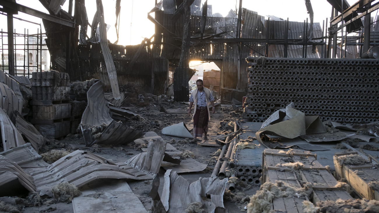 A man walks through the remains of a factory that was bombed twice in September outside of Sana, Yemen, Oct. 29, 2016. AmericaÕs link with Saudi Arabia is leaving its mark on war-torn Yemen, where Saudi-led bombings are ravaging the country, leaving a disastrous economy and a humanitarian crisis on the brink. (Tyler Hicks/The New York Times)