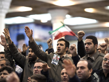 FILE -- People gathered with an image of Gen. Qassem Soleimani to mourn his loss in Tehran, Jan. 5, 2020. The Trump administration escalated pressure on Iran to try to negotiate over its nuclear aims. Instead, Iran fought back with violent attacks. At critical points, each country misjudged the other. (Arash Khamooshi/The New York Times)