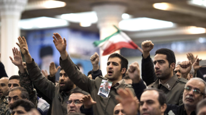 FILE -- People gathered with an image of Gen. Qassem Soleimani to mourn his loss in Tehran, Jan. 5, 2020. The Trump administration escalated pressure on Iran to try to negotiate over its nuclear aims. Instead, Iran fought back with violent attacks. At critical points, each country misjudged the other. (Arash Khamooshi/The New York Times)