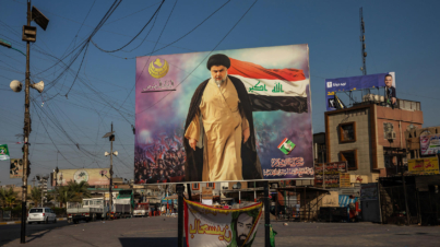 FILE Ñ A poster of the Shiite cleric Moktada al-Sadr in the Sadr City neighborhood of Baghdad, Sept. 30, 2021. Iraqis voted Sunday, Oct. 10, in parliamentary elections meant to herald sweeping change to a dysfunctional political system that has dragged the country through almost two decades of deprivation. (Andrea DiCenzo/The New York Times)