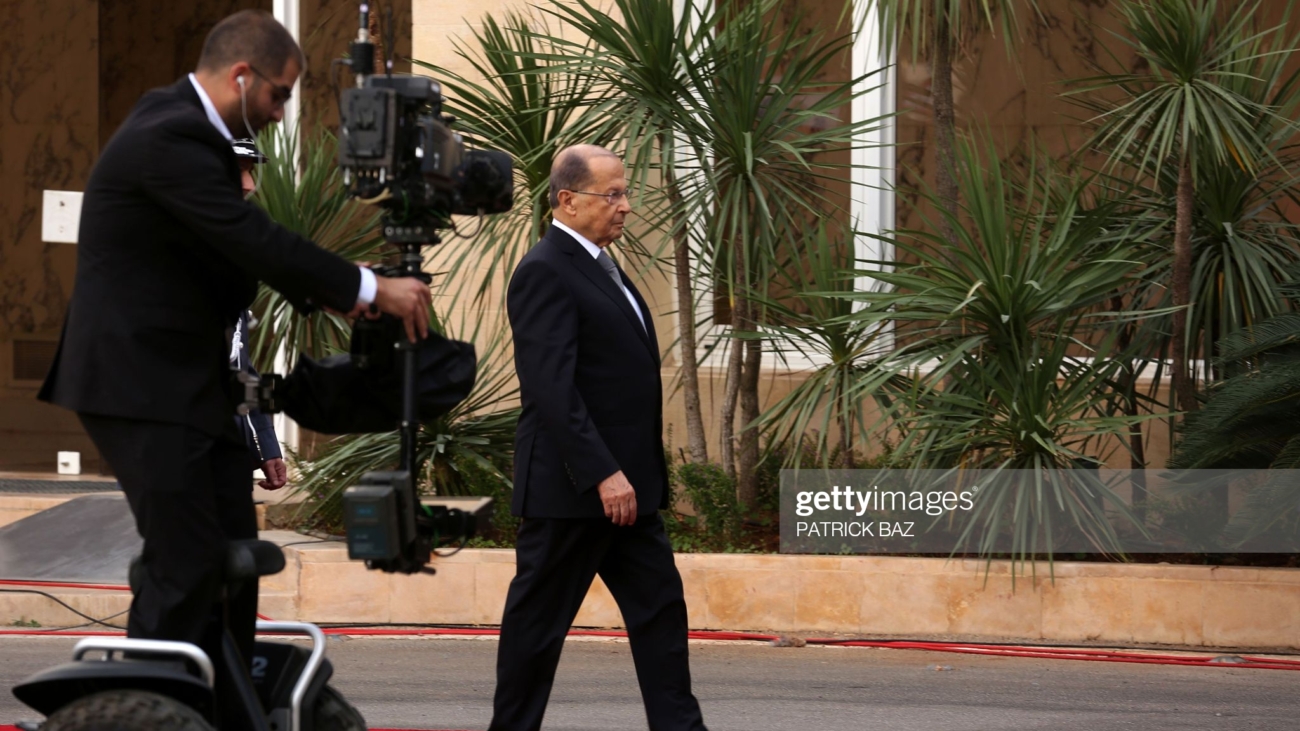 Lebanese president-elect Michel Aoun walks on the red carpet as he arrives at the presidential palace in Baabda, east of Beirut, on October 31, 2016, after he was elected ending a political vacuum of more than two years.


The deeply divided parliament took four rounds of voting to elect Aoun, whose supporters flooded streets and squares across the country to celebrate his victory. / AFP / PATRICK BAZ        (Photo credit should read PATRICK BAZ/AFP via Getty Images)