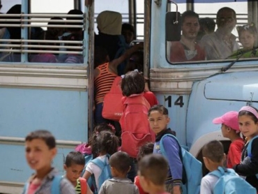 syrian-refugee-children-school-bus-lebanon-768x480-960x480